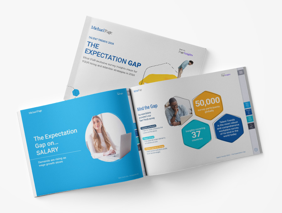 Open survey booklet on salary expectations and global participation stats.