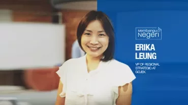 Person smiling with text highlighting regional strategy role at Gojek.
