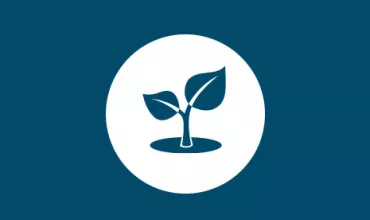 Icon of a plant seedling in a circle on a blue background.