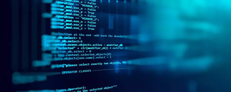 Close-up of computer code on a blue screen
