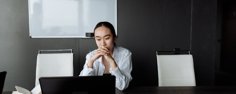 Woman Thinking While Looking at Laptop. Photo by Thirdman via Pexels.